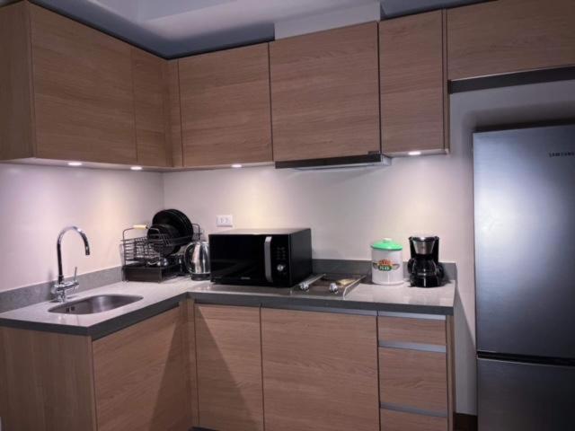 Condo Unit in BGC Taguig Manila with FREE Covered Parking & WiFi